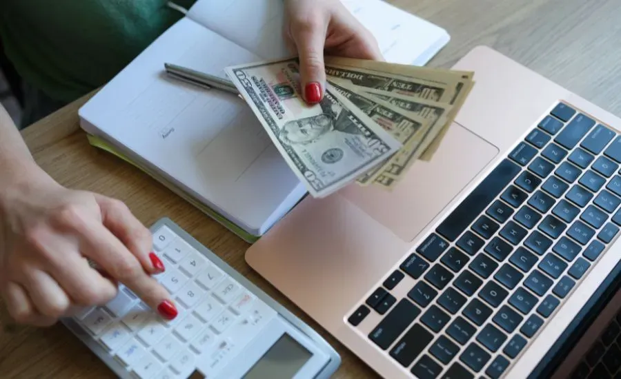 woman calculating money