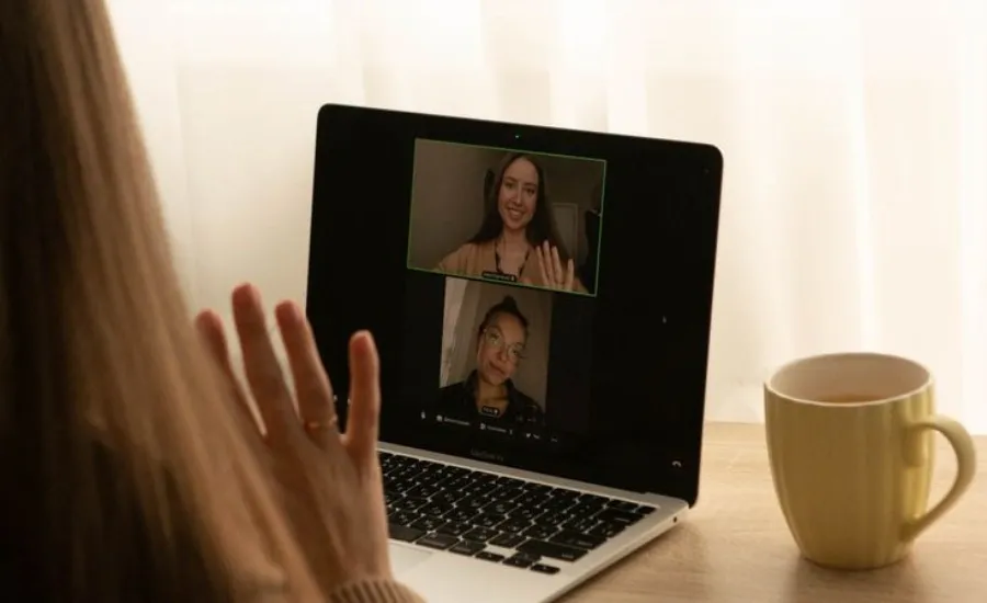 woman having an online interview with two people
